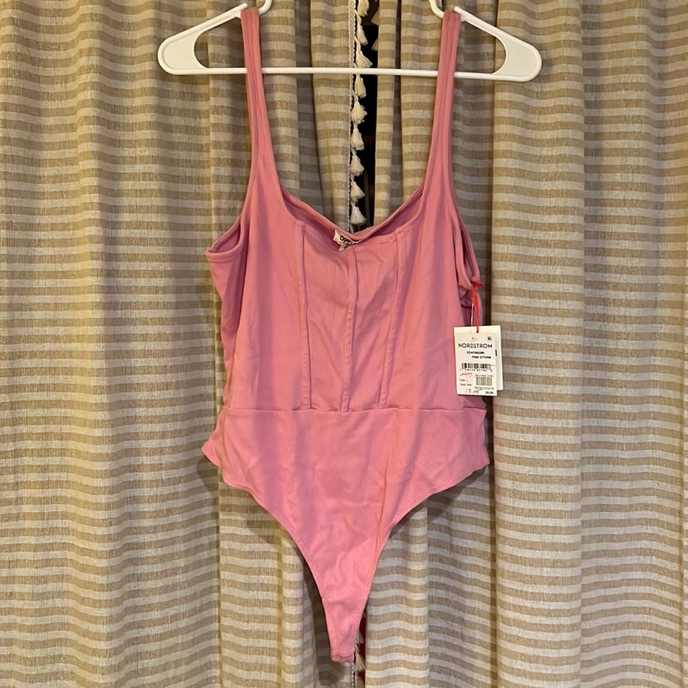 Pink ribbed thong body suit size L